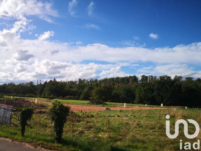 Terrain à bâtir à Parigny (42120) · 56 000 €