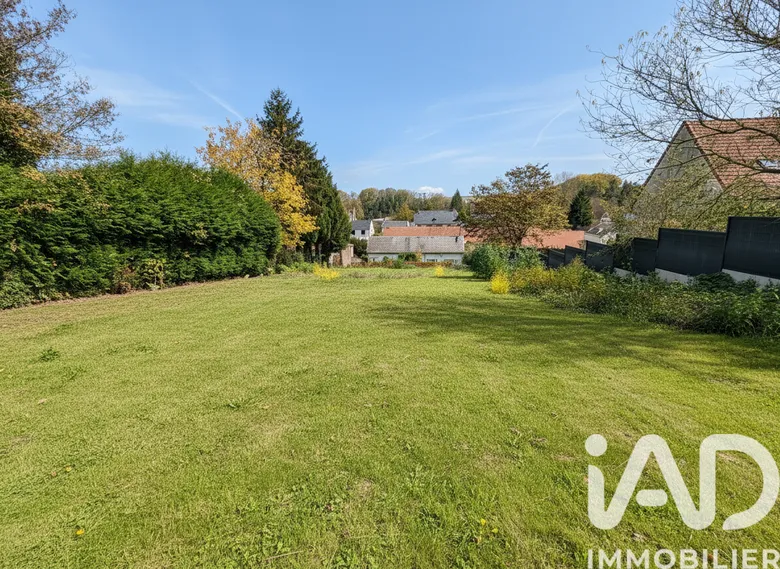 Terrain 852 m² · à Dommartin · 54 000 €