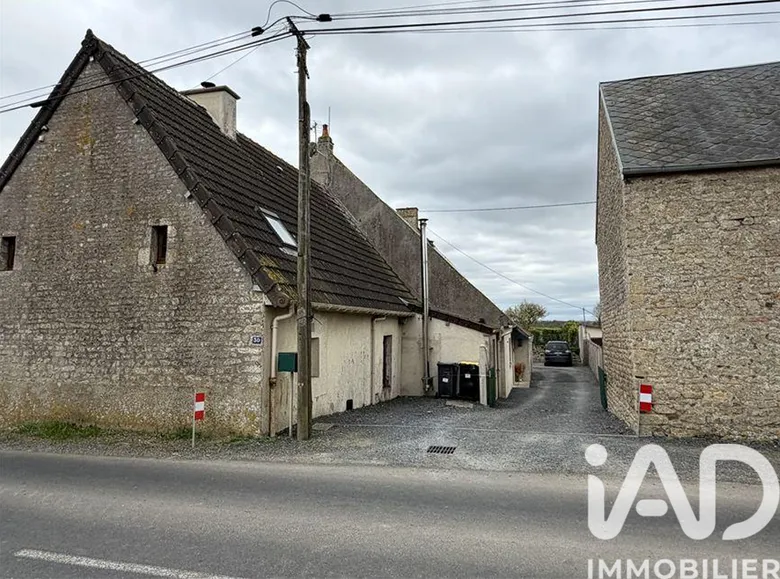 Maison 9 pièces 213 m² · à Cricqueville-en-Bessin · 213 m² · 260 000 €